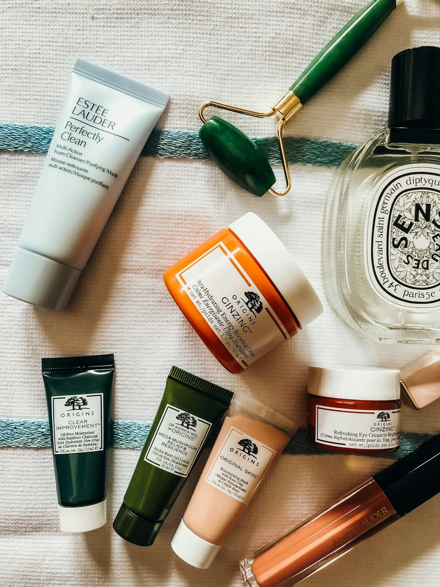Branded skincare products and tools used during home salon appointments