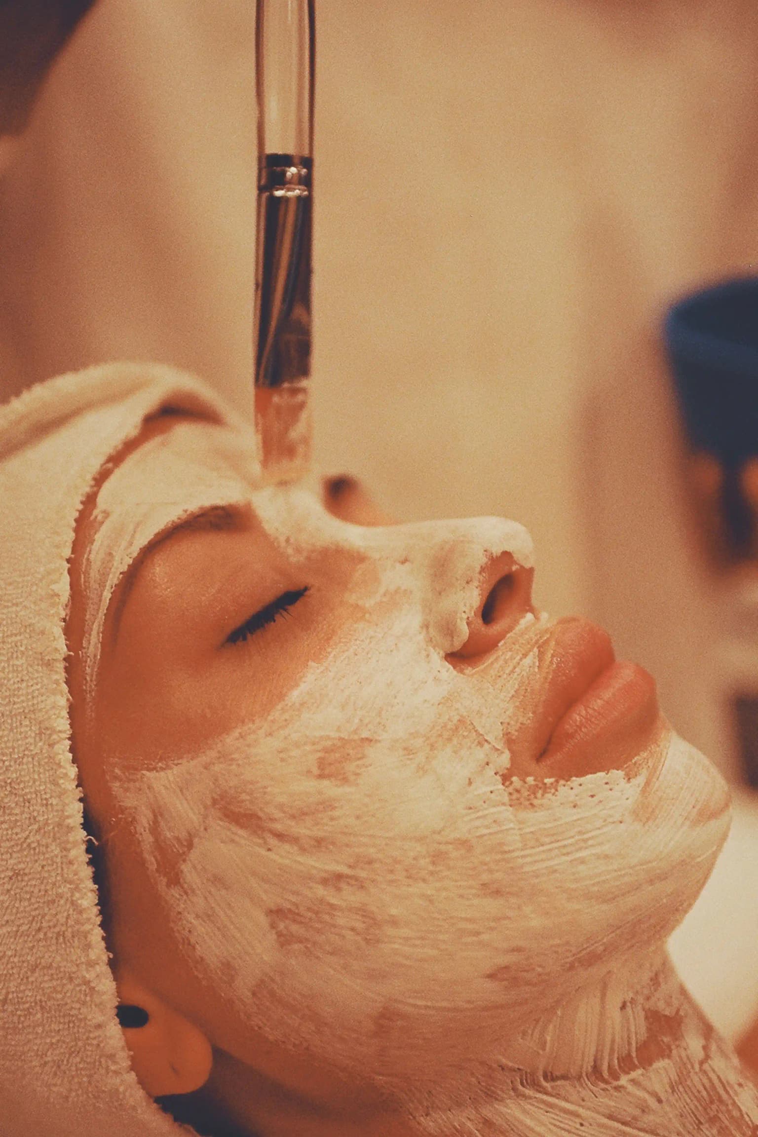 Skin being checked after a facial treatment at home in Jaipur