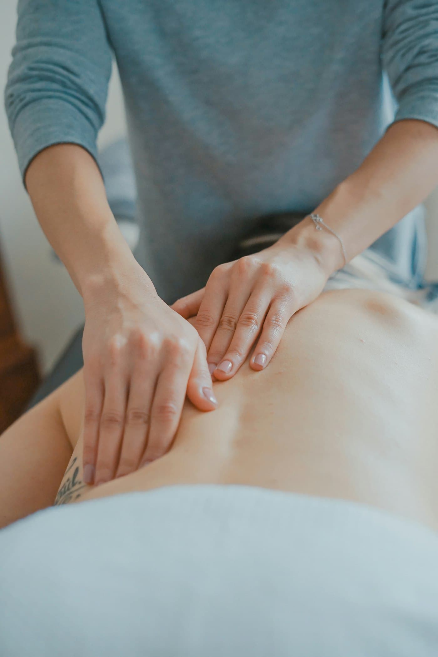 Body polishing treatment being applied to soften and even out skin tone at home in Jaipur